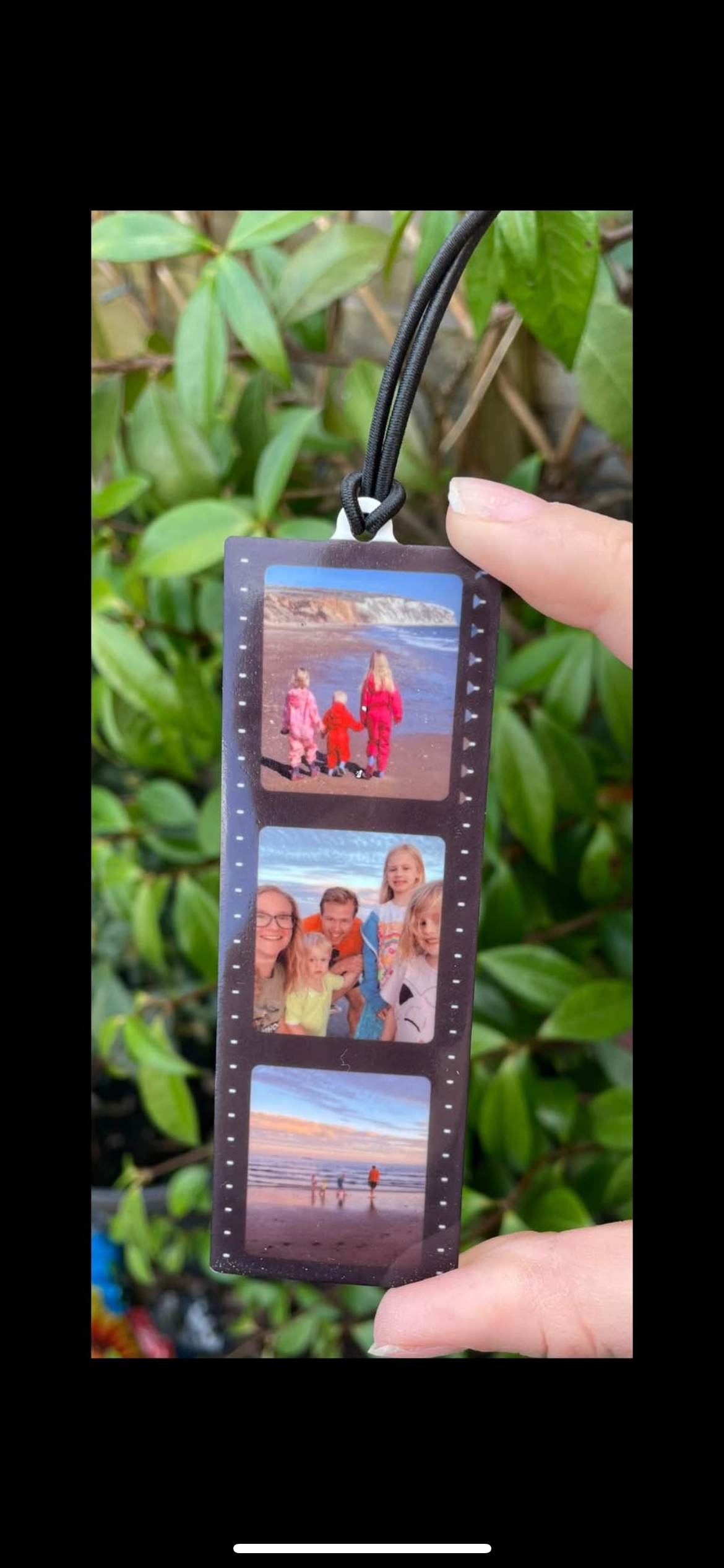 Acrylic photo reel hanger