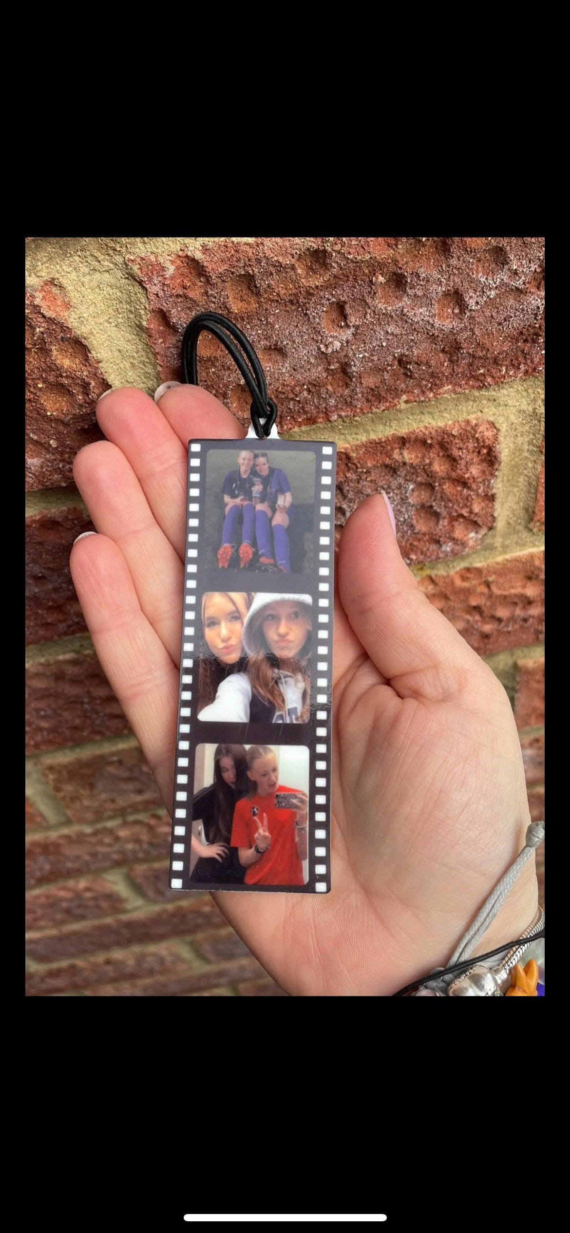Acrylic photo reel hanger